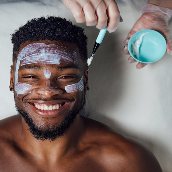 man getting a facial at bliss bar
