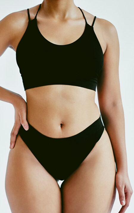 full body of woman in black bikini