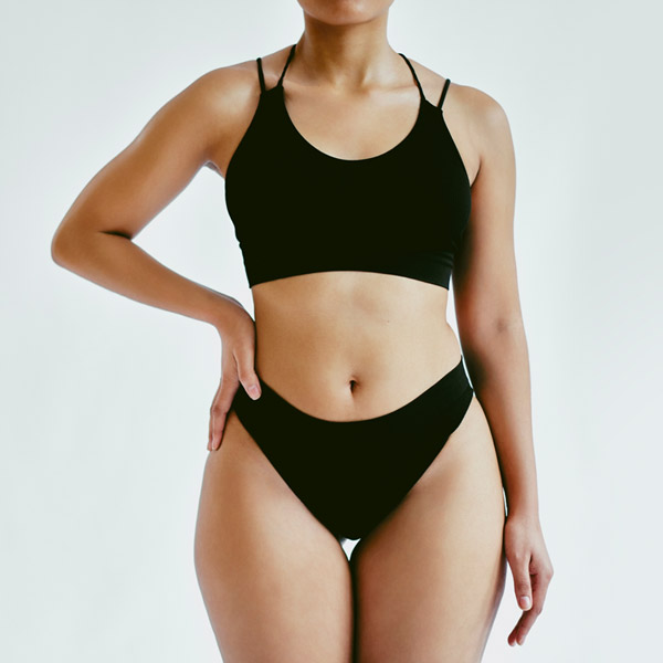 full body of woman in black bikini